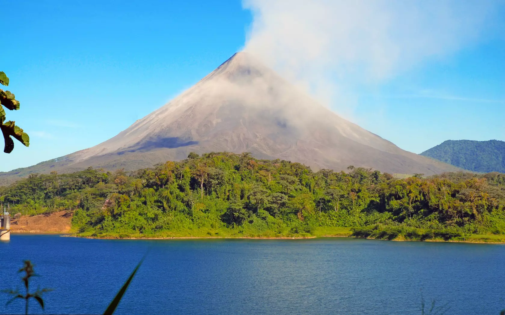 Kayaking on Lake Arenal with the volcano behind