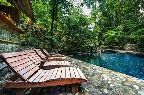 Ecotermales hot spring pools surrounded by forest